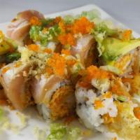 26. Superbowl Roll · Tempura shrimp and spicy crabmeat topped with seared albacore, avocado and Japanese spicy sa...