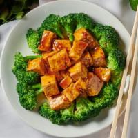 Peking Delight · Hot & spicy. Streamed broccoli & golden brown tofu cubes, slightly coated with a spicy garli...