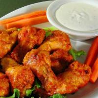 Buffalo Wings · A full pound of delicious wings served with a side of dressing