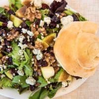 Apple Walnut Salad · Mixed greens tossed with granny Smith apples, sugared walnuts, dried cranberries and balsami...