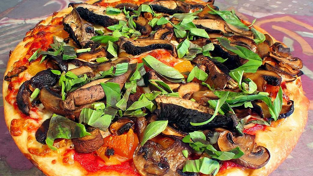 Joliet Jake Pizza · Four kinds of mushrooms, shiitake, portobello, cremini and button, with dried apricots, and fresh basil.