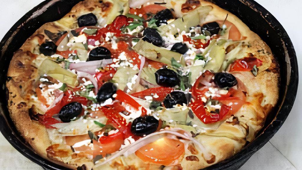 Greektown Pizza · Delicious crust brushed with olive oil, topped with red onions, artichoke hearts, roma tomatoes, Kalamata olives, peppadew peppers, feta cheese, and fresh oregano. No diced tomatoes added.