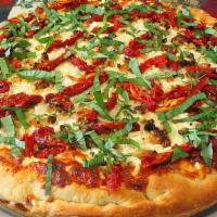 Al Bundy Pizza · Feta cheese, fresh roasted garlic, fresh basil, sundried tomatoes. No mozzarella on this one.