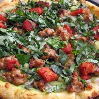 Sun Times Pizza · Pesto sauce, Italian sausage, red onions, pineapple, and fresh basil.