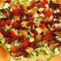 Wrigley Field Pizza · Pesto sauce, feta cheese, teriyaki chicken, roasted garlic, and sundried tomatoes.