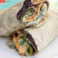 Chile Relleno · Battered and fried poblano Chile stuffed with cheese and herbs, black beans, tomato Chile sa...