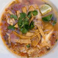 Sopa de Lima · Tortilla soup with chicken, lime, tomato, onion, cilantro, garlic, and serrano chiles
