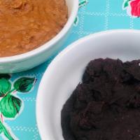 Bean and Rice Sides   · Choice of black beans, black beans and rice, refried pinto beans, refried pinto beans and ri...