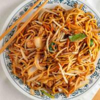 Chicken Lo Mein · Soft noodles cooked in a brown sauce mixed with green onions laba and strips of carrots and ...