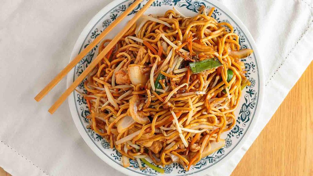 Chicken Lo Mein · Soft noodles cooked in a brown sauce mixed with green onions laba and strips of carrots and bamboo shoots.