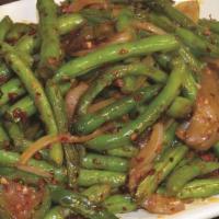 82. Pan Fried String Beans w/ Chili Sauce干扁四季豆 · Hot & spicy.
