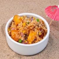 Pineapple Cauliflower Fried Rice · Roasted cauliflower rice, roasted pineapple, peas, corn, green onions, and sesame seeds with...