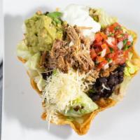 Taco Salad with Meat(Your Choice) · Served on a bed of beans, crispy tortillas, lettuce, enchilada sauce, guacamole, corn, sour ...