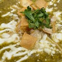 Large Green Chicken Enchilada Soup · Made with Green tomatillo base and chicken breast and topped off with Sour cream, queso fres...