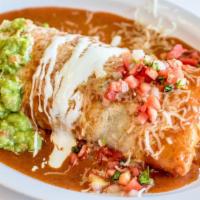El Burrito Mojado Regular · Mojado Style with topped with enchilada sauce & jack cheese.