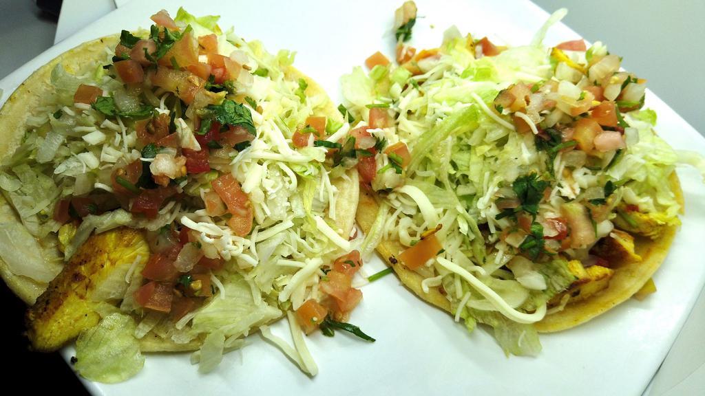 Grande Tacos (2) · Your choice of meat with jack cheese, shredded lettuce and salsa fresca.