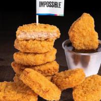 Impossible 10 Piece Nuggets · Crispy fried Impossible chicken nuggets; served with choice of dipping sauce. plant-based/ve...