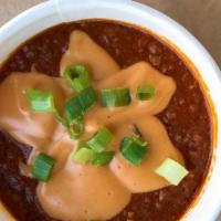 HAUS CHILI · chili, cheddar cheese sauce, diced onions