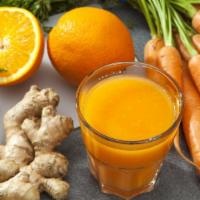 Ginger Spice Juice · Fresh juice made with Ginger, lemon and carrots.
