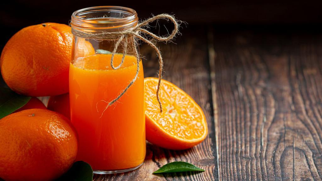 Freshly Squeezed Orange Juice · Fresh 20 oz juice freshly squeezed with oranges.