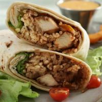 Super Chicken Burrito · A mouthwatering Super Burrito made with a Flour tortilla and filled with chicken, rice, bean...