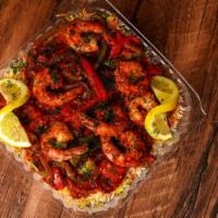 Shrimp Plate  · Salad, beta bread or rice, red sea sauces.