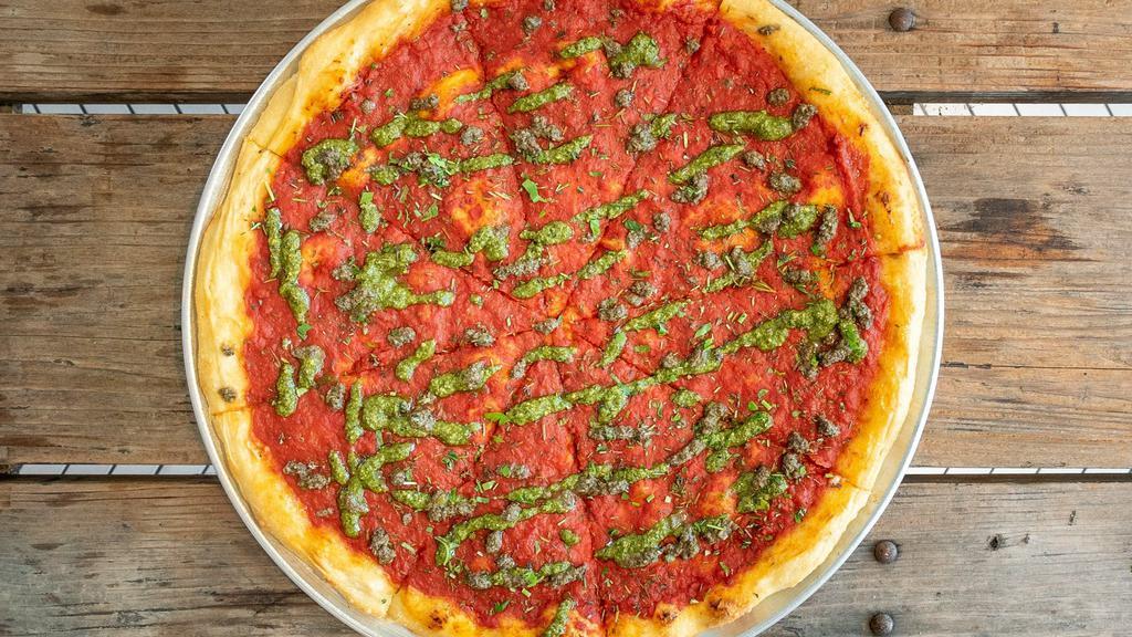 Vegan Superstar · House tomato sauce, pesto drizzle, olive tapenade, basil and herbs. Made with our hand-streched, housemade cold-fermented dough.