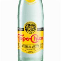Topo Chico · Carbonated Mineral Water.