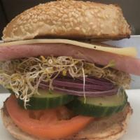 5. Ham And Cheese Sandwich · Ham, swiss cheese, cucumber, tomato, red onion, sprouts, mayonnaise and mustard.