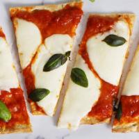 Caprese · Our classic flatbread topped with tomato sauce, fresh mozzarella, and fresh basil.