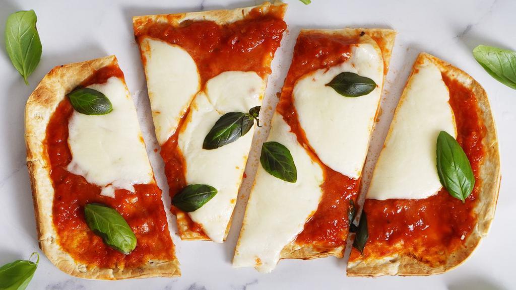 Caprese · Our classic flatbread topped with tomato sauce, fresh mozzarella, and fresh basil.