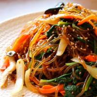 Japchae · Sweet and savory dish of stir fried glass noodle and veg.