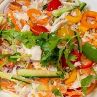 Glass Noodle Salad · Mung-bean noodles served with shredded chicken, green cabbage, carrots, sweet peppers, red o...