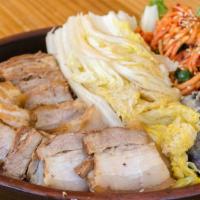 Pork belly wraps · steamed thick cut pork belly with fresh crisp napa cabbage and raw oyster with radish kimchi...