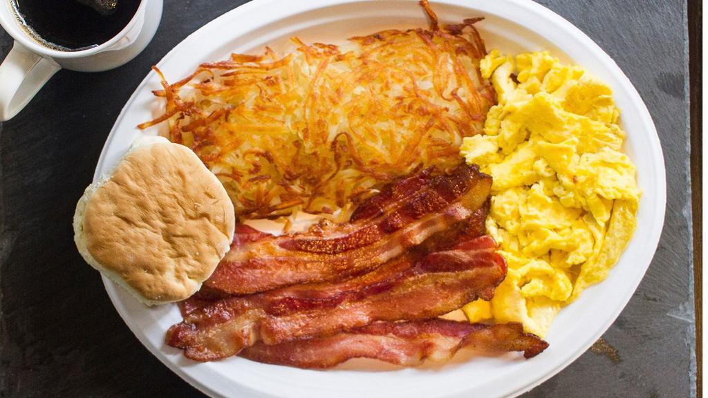 2 Eggs Feature · Two eggs any style served with hash browns and choice of biscuit or toast.
