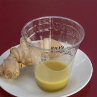 Ginger Shot · Fresh Ginger Juice. Vegan and Gluten Free.