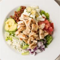 Cobb Salad · Mixed greens salad with grilled chicken, avocado, bacon, hard boiled eggs, tomatoes, red oni...
