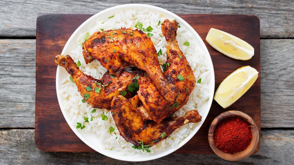 Chicken Tandoori Leg · Chicken marinated in yogurt and special spices, cooked on skewers in a clay oven.