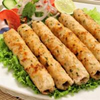 Chicken Boti Kabab · Boneless chicken breast marinated in spices and mustard, cooked in clay oven.