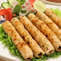 Chicken Seekh Kabab · 2 pieces. Ground chicken blended with rare selection of delicious herbs and spices. Barbecue...