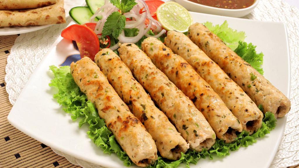 Chicken Seekh Kabab · 2 pieces. Ground chicken blended with rare selection of delicious herbs and spices. Barbecued on skewer and tenderly cooked in clay oven.