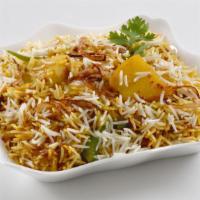 Bombay Dum Biryani · Special lamb or goat meat cooked with special spices and saffron flavored basmati rice.