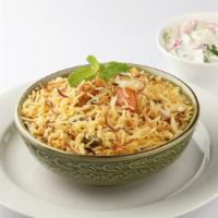 Vegetable Dum Biryani · Garden vegetable cooked with selected spices with saffron flavored basmati rice.
