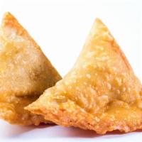 2 Pieces Vegetable Samosa · Deep fried samosa with potato and pea filling.