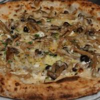 Fungo Pizza · Wild Mushrooms, goat cheese, fontina cheese, thyme, truffle oil, italian chilies