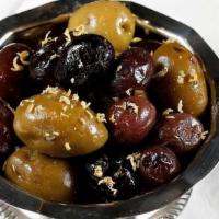 Olives Plate · Assorted Mediterranean olives . with herbs and lemon zest