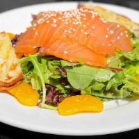 Salmon Salad · Smoked salmon served with fresh salad mix, mandarin orange, silvered almonds and sesame wont...