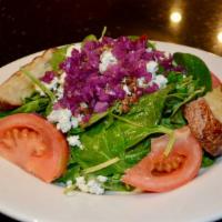 Spinach Salad · Fresh spinach, spicy pecans, crumbled gorgonzola, red onions, tomatoes and honey creole dres...