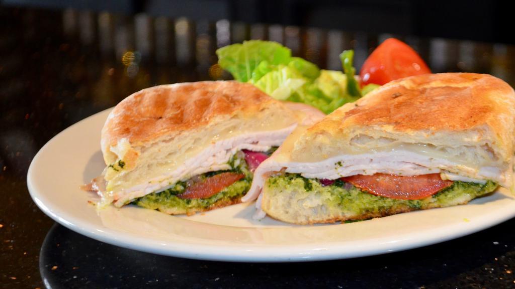 Turkey · Smoked Turkey, tomatoes, red onions, provolone, and house made pesto.