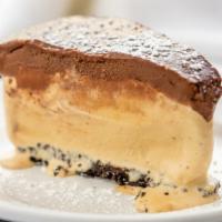 Coffee Ice Cream Pie · Oreo cookie crust, coffee ice cream & topped with chocolate ganache frosting.